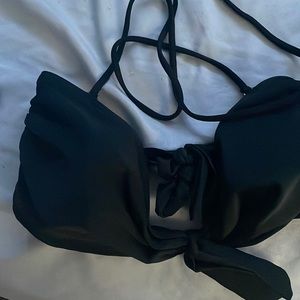 New swim top. Lightly worn. Not uncomfortable and hold well while at beach.